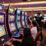Players enjoying slots at 98wincom casino with vibrant colors and festive atmosphere.